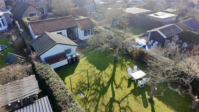 Tuin en buitenkant van het vakantiehuisje