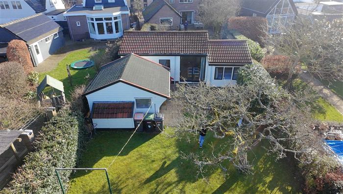 Tuin en buitenkant van het vakantiehuisje