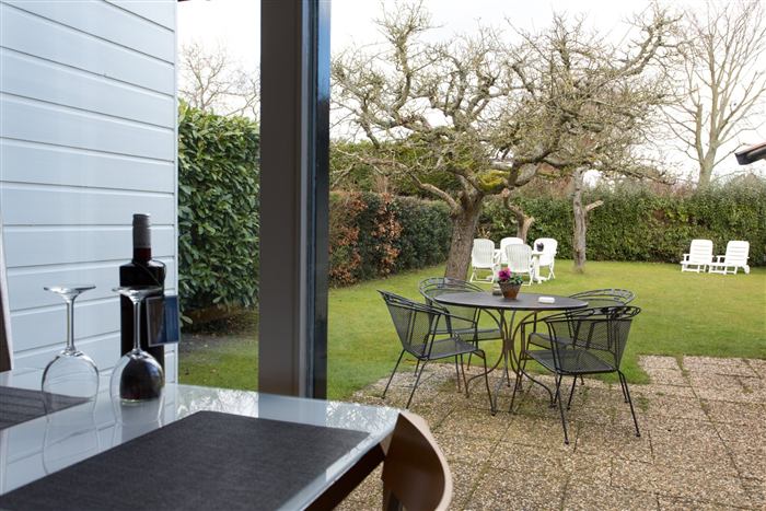 Tuin en buitenkant van het vakantiehuisje
