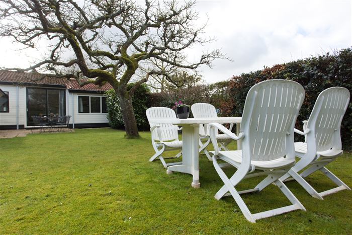 Tuin en buitenkant van het vakantiehuisje