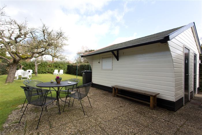 Tuin en buitenkant van het vakantiehuisje