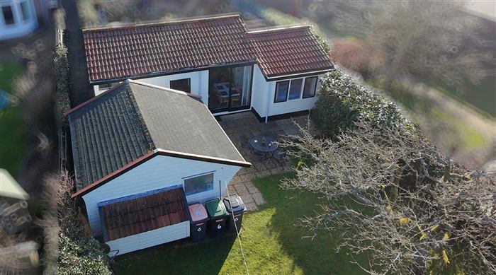 Tuin en buitenkant van het vakantiehuisje